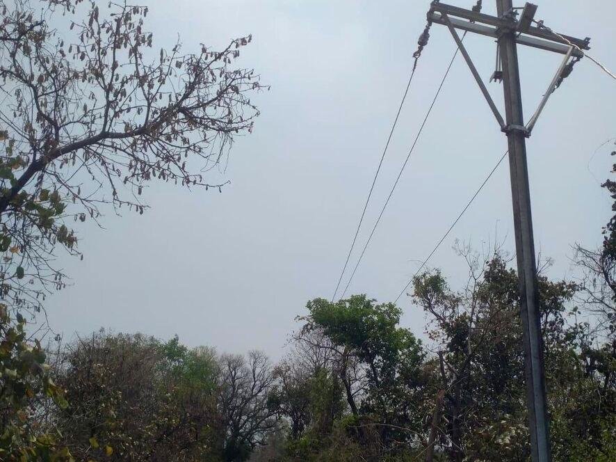 Electric pole erected alongside a rural road alignment